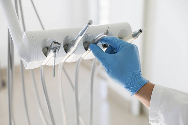 Professional Tooth Extraction technician working in Hutto, TX